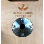 Gorletic Handstand Canes compact front view of the base plate while the Calisthenics Worldwide logo is being laser etched onto it.