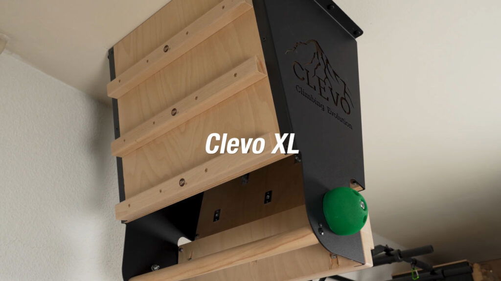 The CLEVO Ceiling XL Pull-Up Bar outfitted with campus rungs on one side, climbing balls on the sides and a hang board on the back.