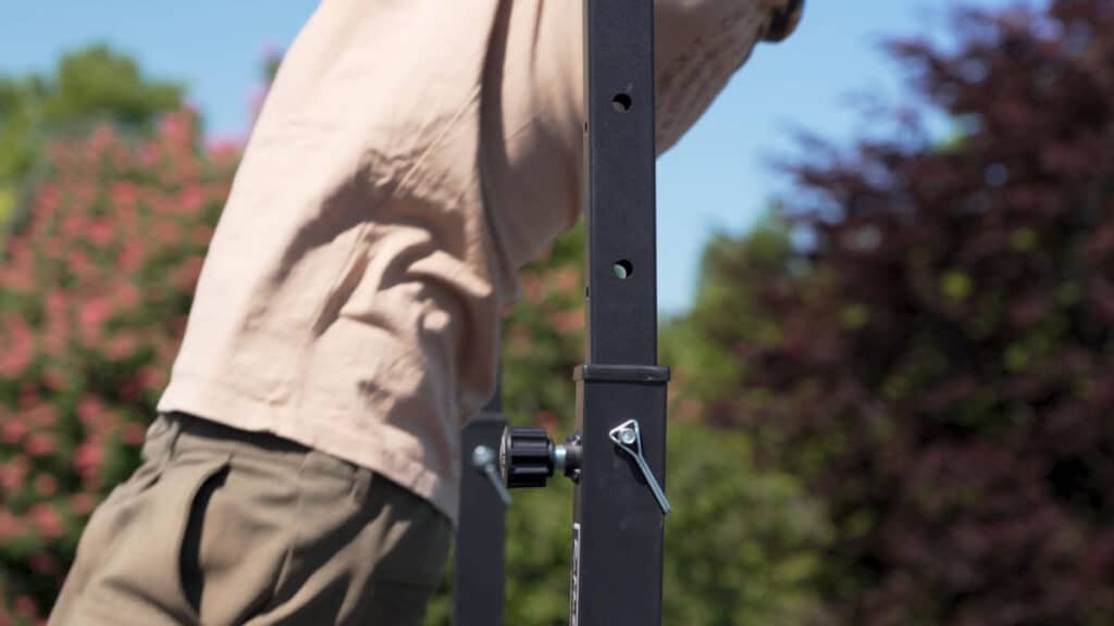 Close side shot of the RaMass Fitness Free-Standing Pull-Up Bar showing that it wobbles inside its sockets.