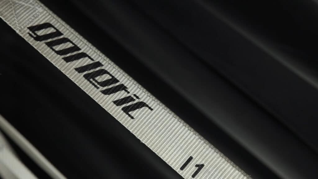 Close up of the straps belonging to the Gorletic Gymnastic Rings with the brand name Gorletic printed on it and the number 1 marking visible.