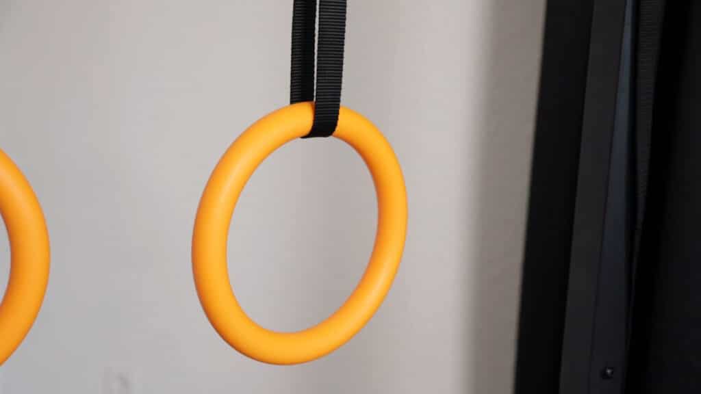 Two Noyaya Gymnastic Rings hanging side by side.