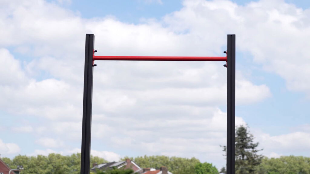 The top bar of the FitnessKit Basic Strength Bar standing on a roof outside.