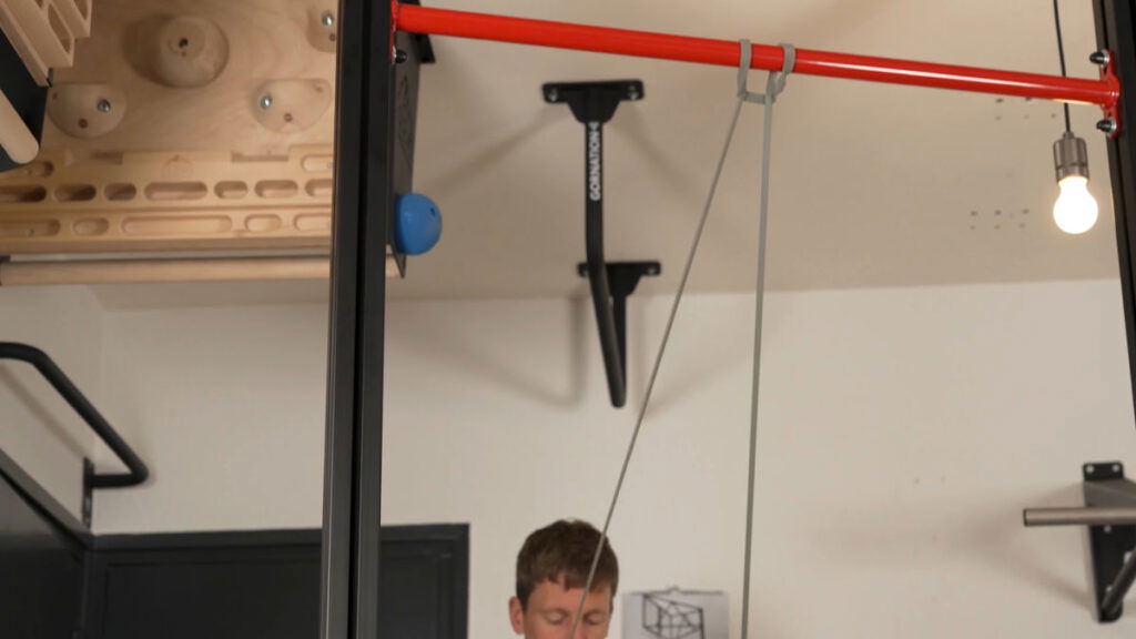 A resistance band used for warm-ups on a FitnessKit Basic Strength Bar.