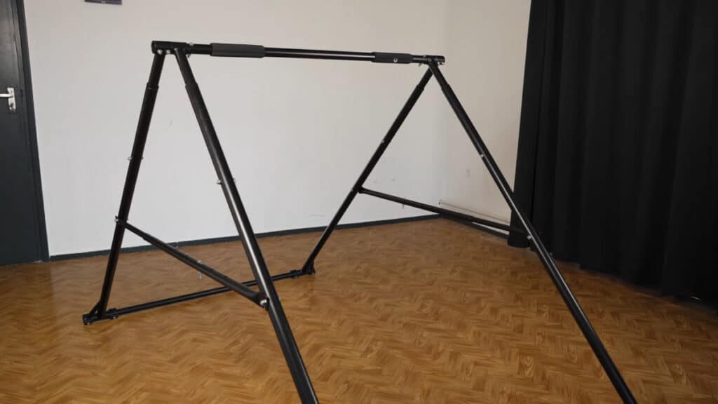 The Khanh Trinh Pull-Up Bar standing in an empty room in its lowest configuration as a Static Bar.