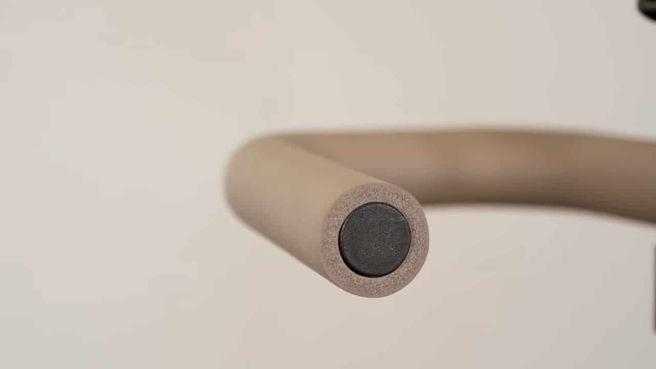 Close up of the thicker foam around the dip handles of the bullbar 2.0 foldable pull-up bar.