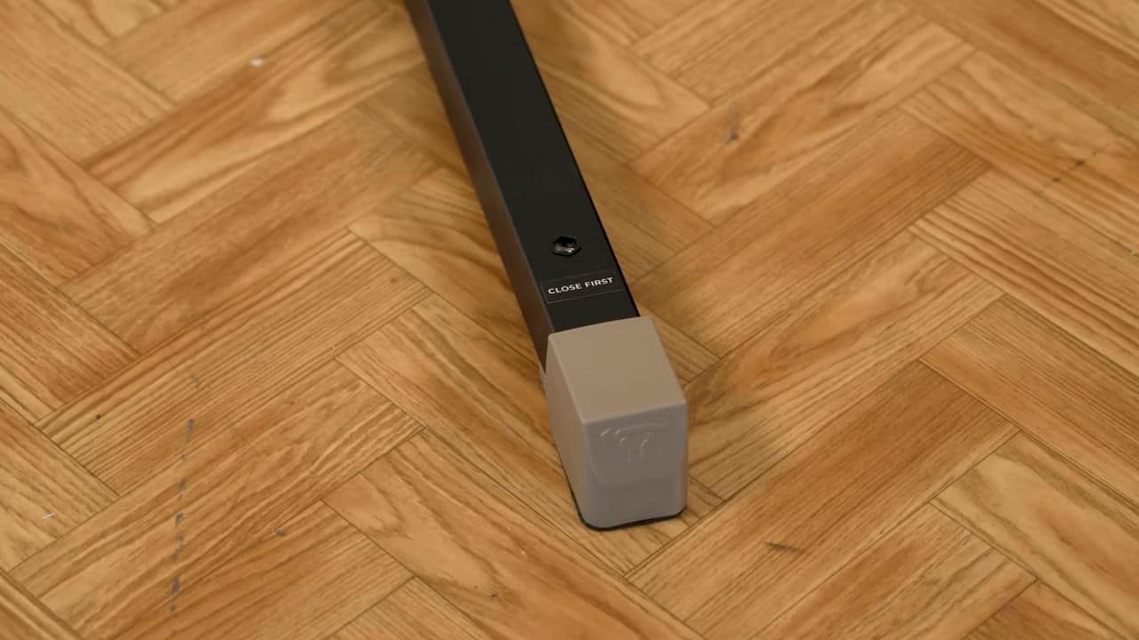 Close up of one of the rubber caps on the legs of the bullbar 2.0 foldable pull-up bar, with the bullbar logo visible.