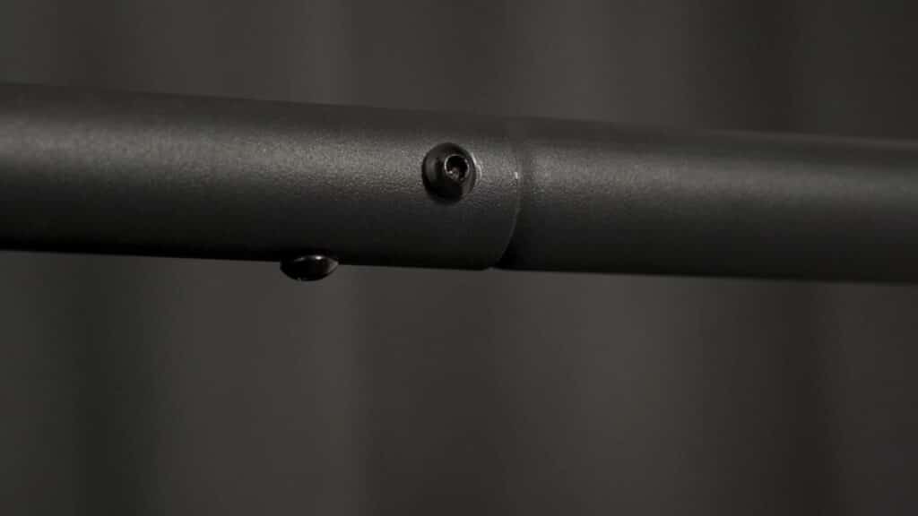 Close up of the Eric Flag Static Bar, showing the screw heads protruding from the center of the top bar.