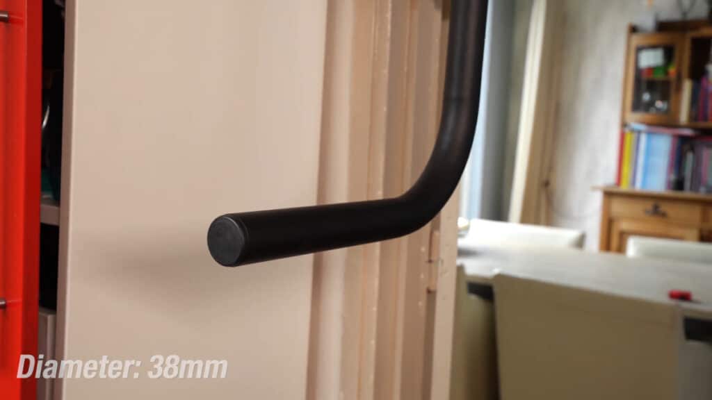 Close up of one of the 38mm parallel bars of the Pullup & Dip Doorway Dip Bar.