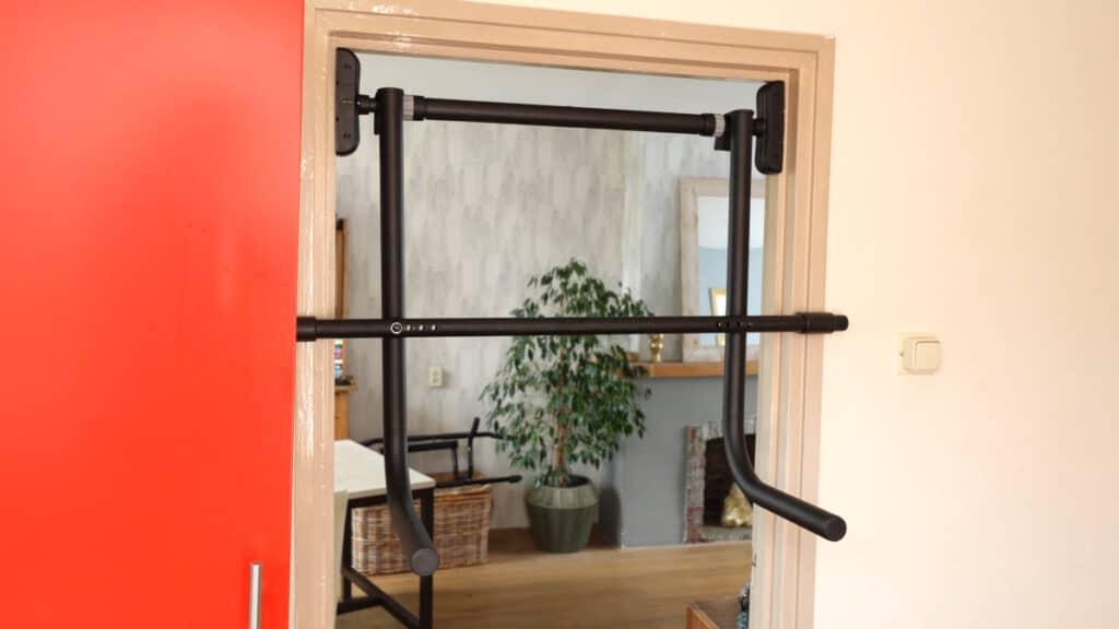 Front view of the Pullup & Dip Doorway Dip Bar hanging from the Pullup & Dip Telescoping Bar.