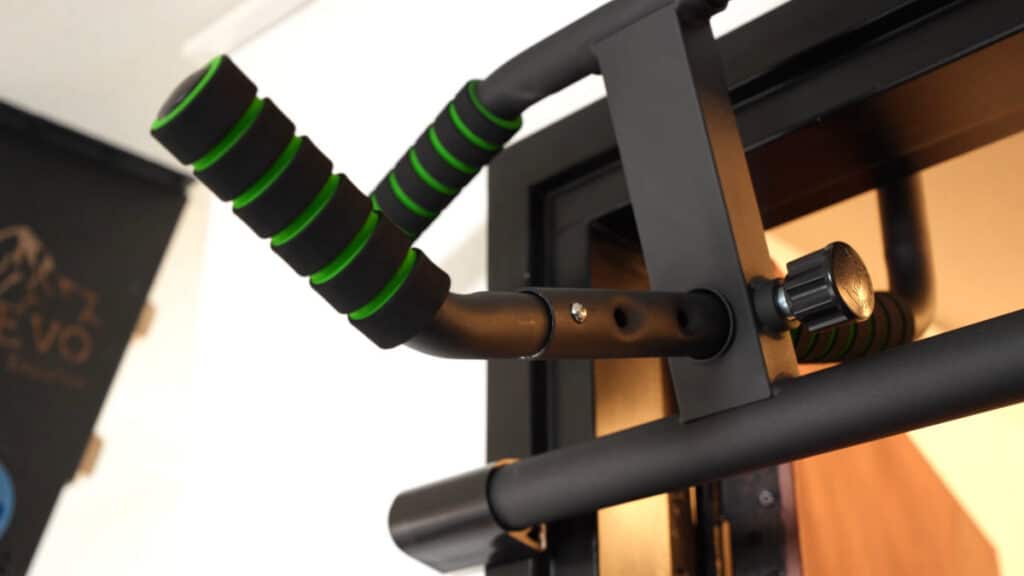 Close up of a neutral grip and adjustable slide on the KAKICLAY Pull-Up Bar Multi Grip with which the wall offset can be manipulated.