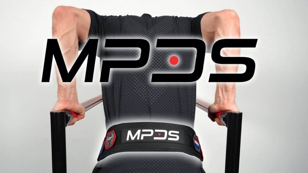 Man in black shirt doing heavy weighted dips while wearing the MPDS dip belt.