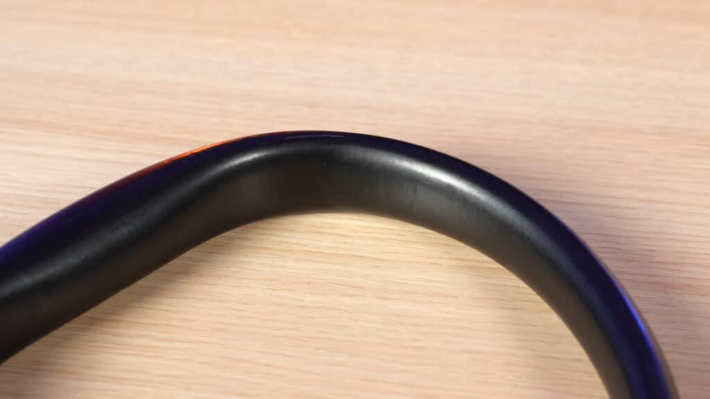 Close up of the MARMATI Weightless Gymnastic Rings, showing the thinner sides and much thicker false grip bottom side.