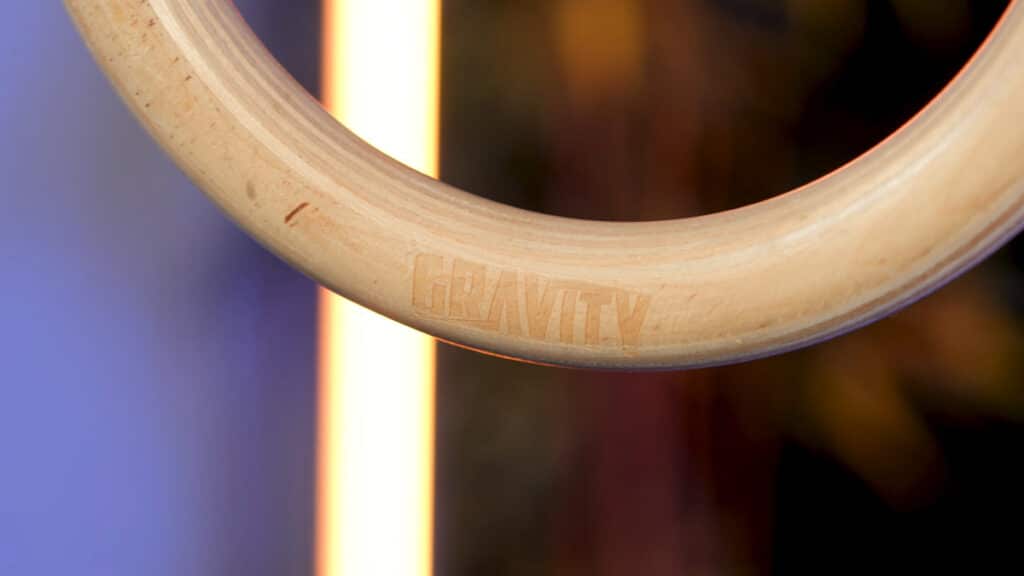 Close up of the etched logo on the gravity fitness gymnastic rings.