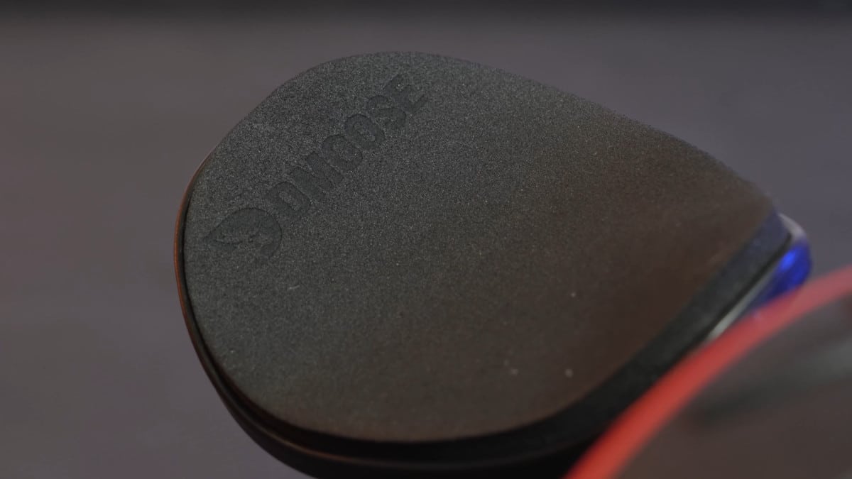 Detail of the pads on the elbow rests on the dmoose ab roller with the DMoose logo barely visible on the top edge.