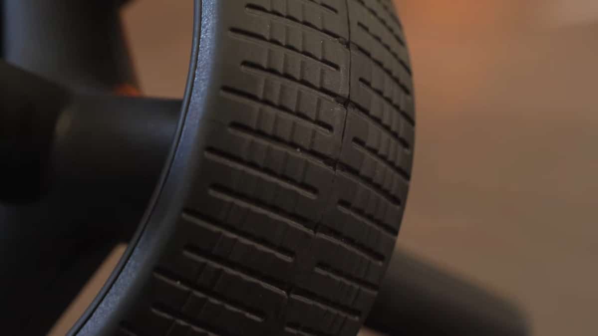 Close up of the rubber profile on the rogue ab wheel, showing a checkered grid design.