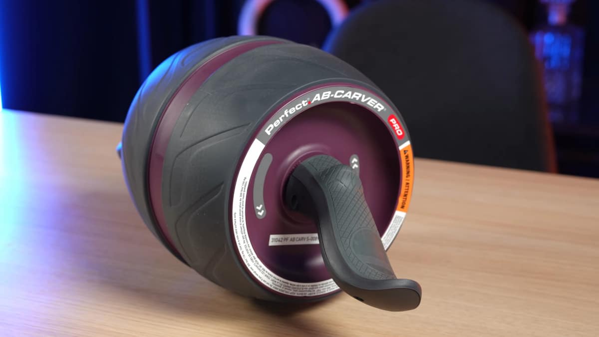 A Perfect Fitness Ab Carver Pro assembled and resting on a table, ready for use.