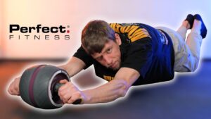 Man in black shirt doing an ab rollout on the Perfect Fitness Ab Carver Pro while looking suspiciously as the camera.