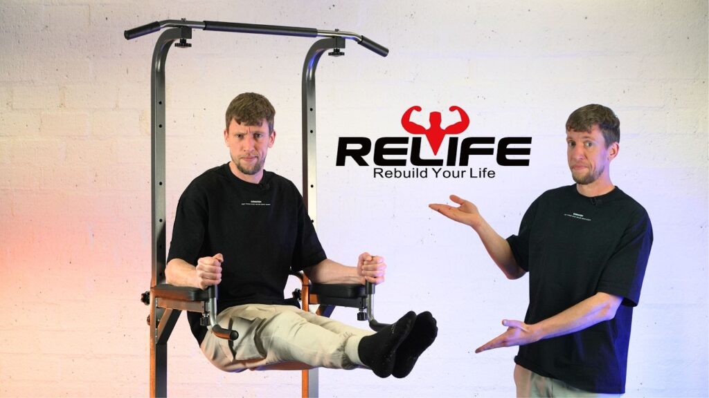 Man appearing twice in the image, once doing an L-sit on the relife power tower and the second where is standing with arms in a presenting fashion towards the same power tower.