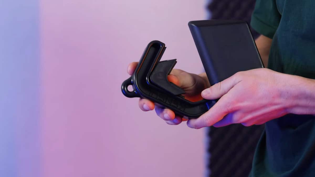 Man attaching an angle modifier to the inside of the kensui swissies v2 max.