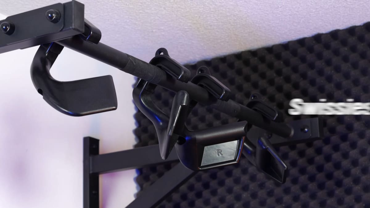 The kensui swissies v2 max p and v2 max s hanging on a gornation pull-up bar.
