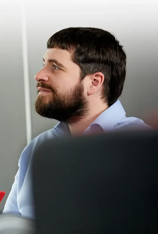 A man with beard in profile