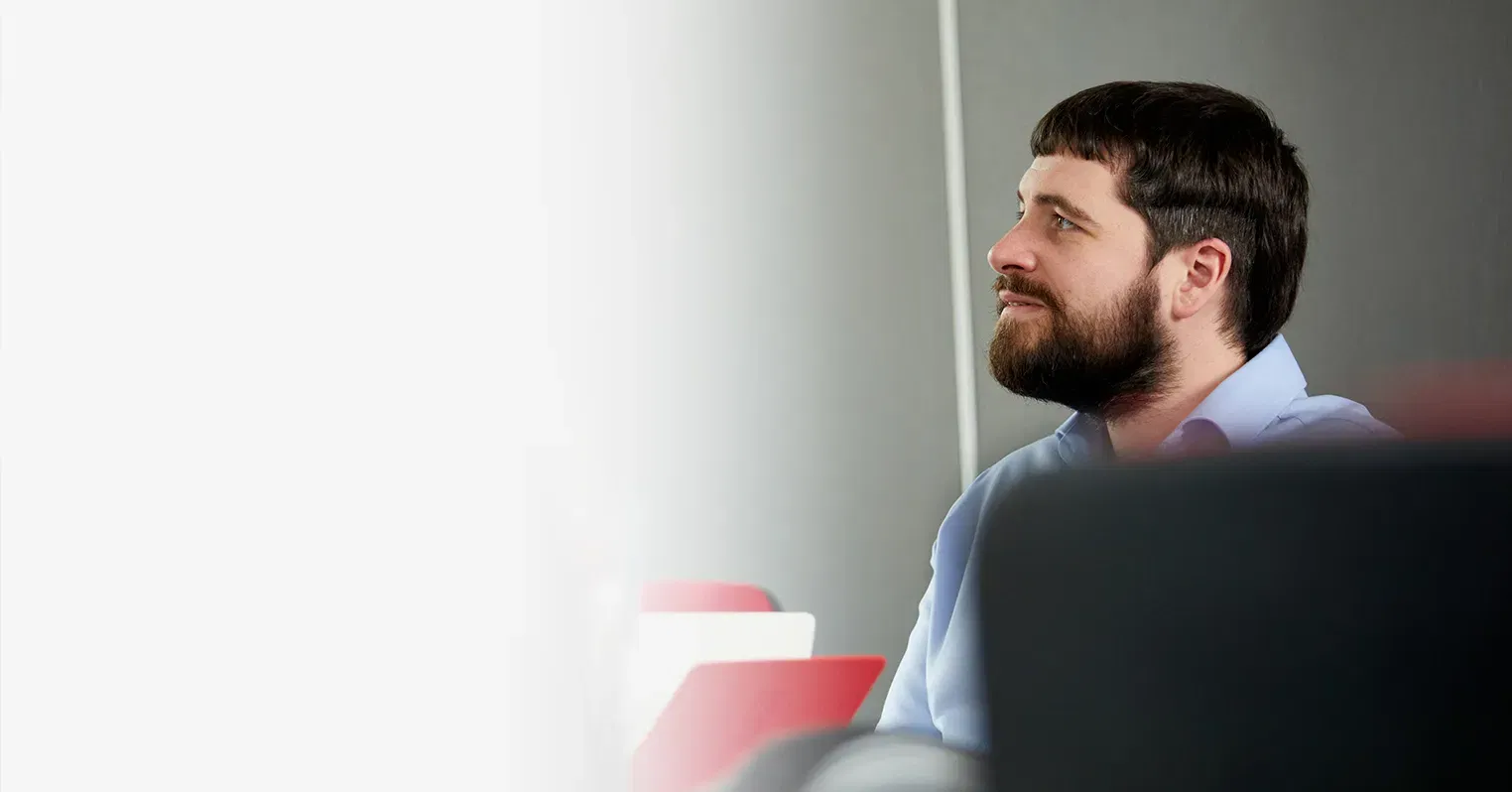 A man with beard in profile