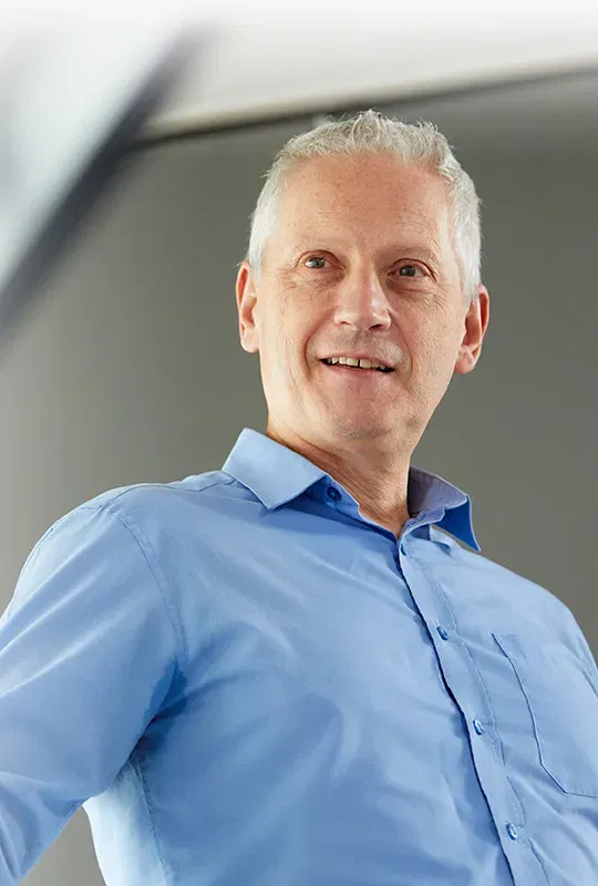 A man wearing a blue shirt