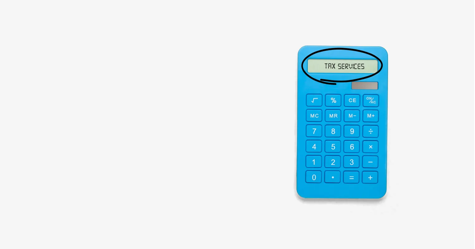 A blue calculator with 'tax services' on the screen