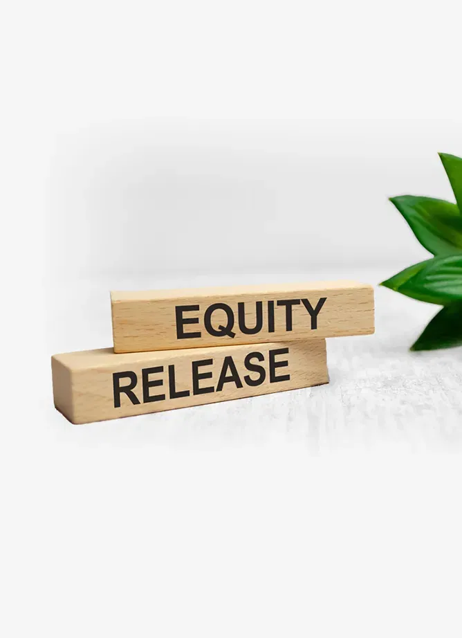 Two wooden blocks with black lettering. One reads 'equity', the other 'release'