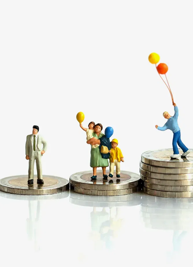 4 different sized piles of coins. The largest on the right has a small toy house on top, the others have a variety of toy figures