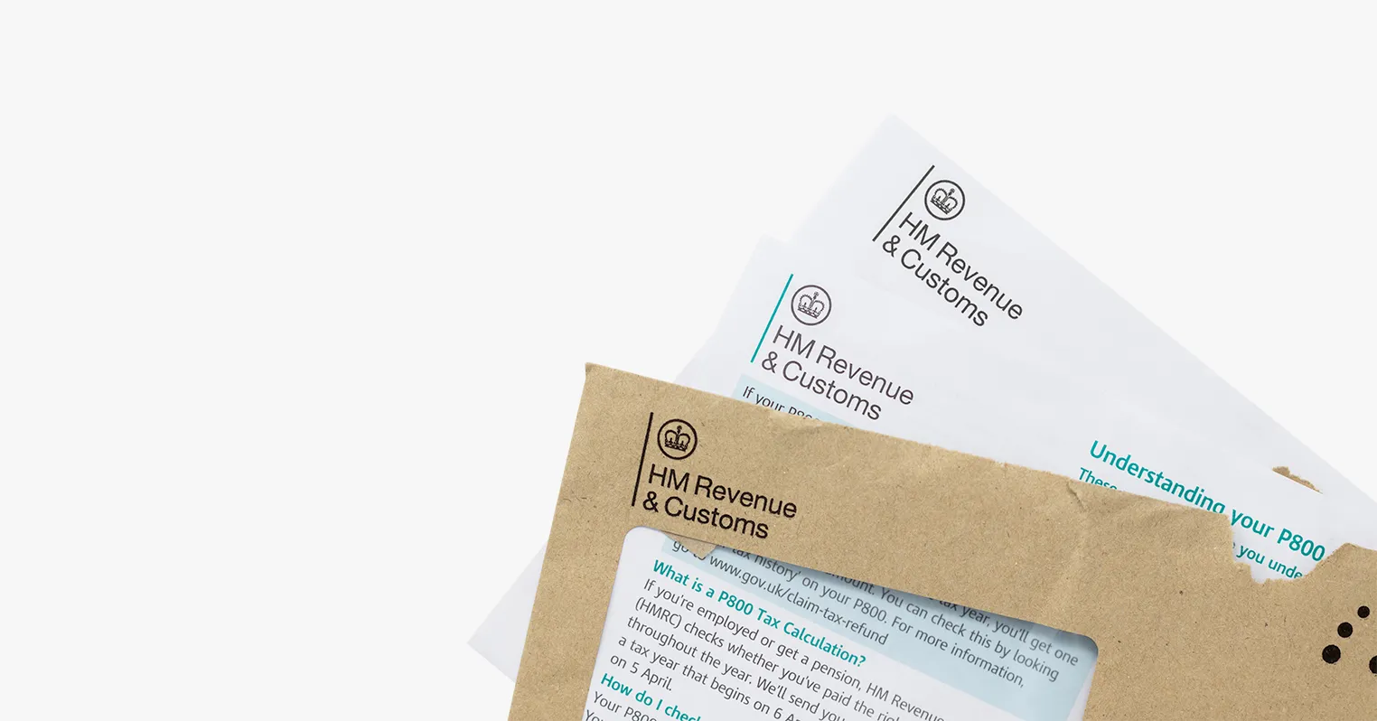 A photo showing an envelope from HMRC with two pieces of HMRC letterheaded paper sticking out of the top